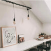 Tringle murale pour suspendre des luminaires dans une cuisine