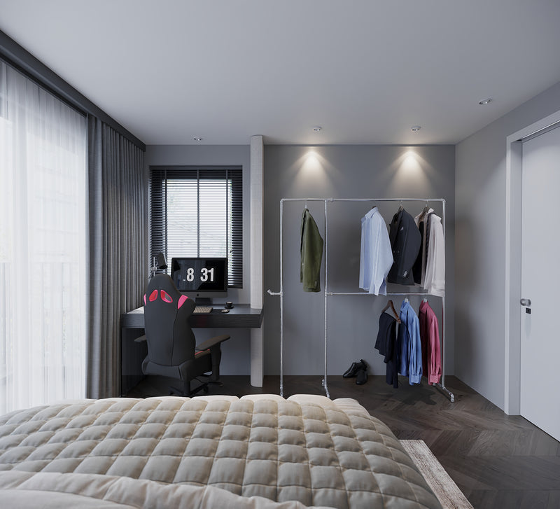 Portant à vêtements argenté placé dans chambre d'ado
