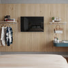 étagère murale avec tringle à vêtements intégrée pour une chambre